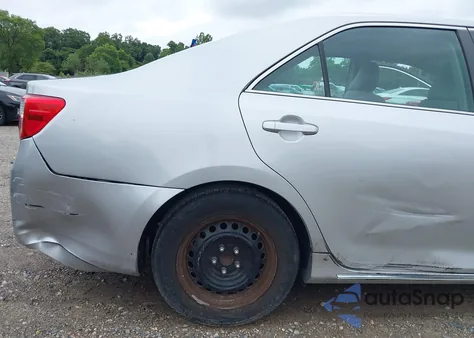 2014 Toyota Camry Le z USA, uszkodzony, nr VIN 4T4BF1FK4ER423106